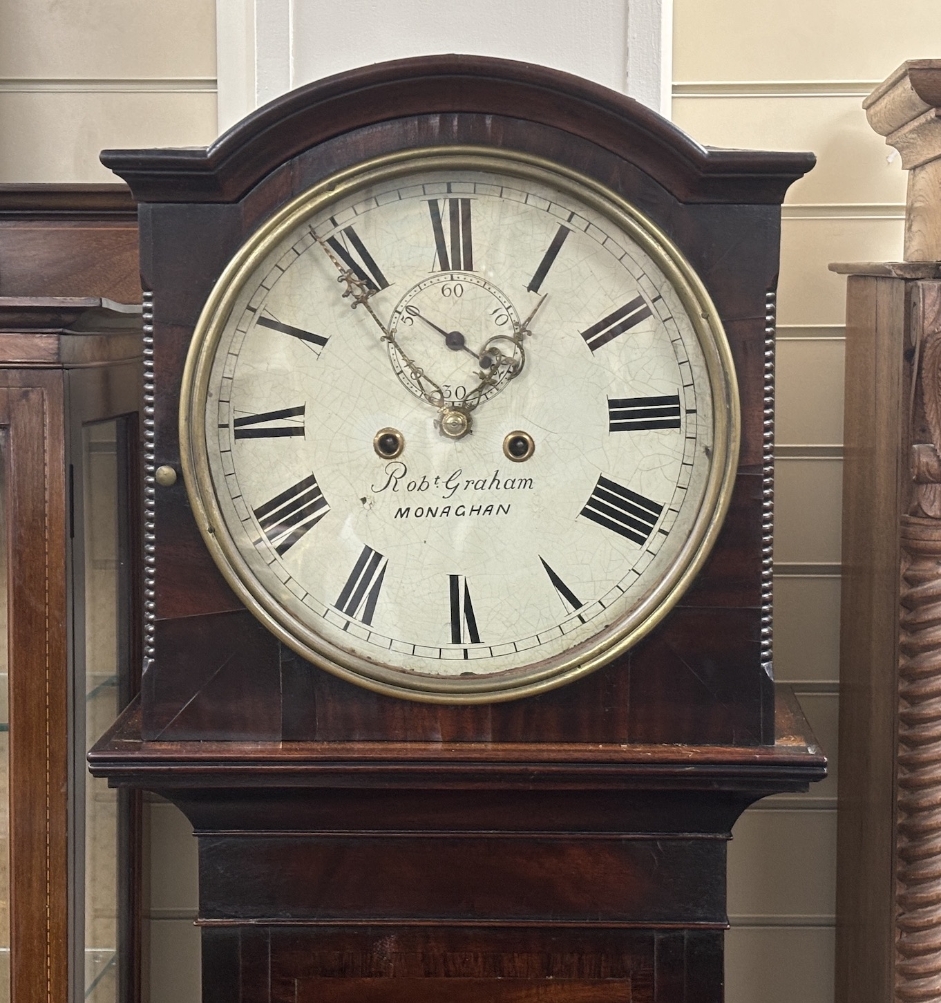 An early 19th century Irish mahogany eight day longcase clock, circular painted dial marked Robert Graham of Monaghan, height 193cm